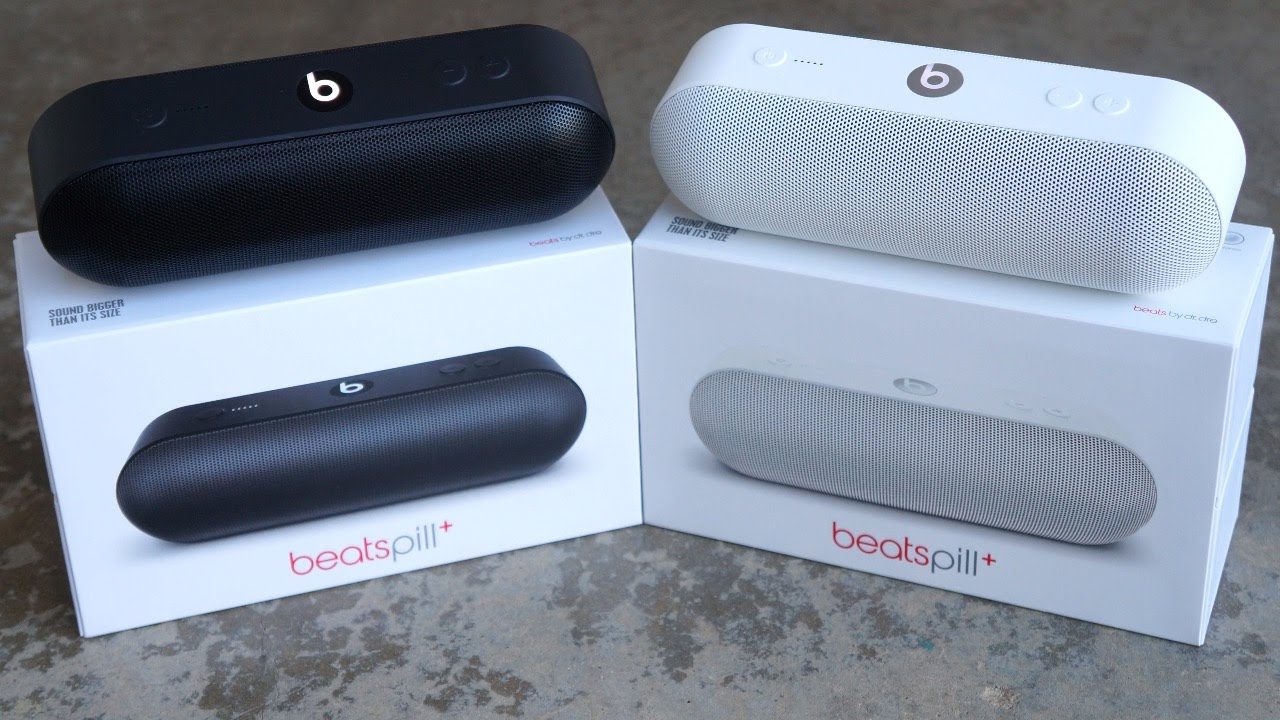 Beats Pill speakers sitting in their box.