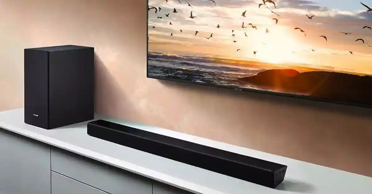 Samsung soundbar placed underneath a TV
